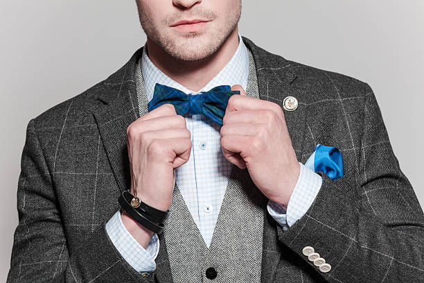 istock Classical elegance, man wearing tweed jacket and bow tie 506754112