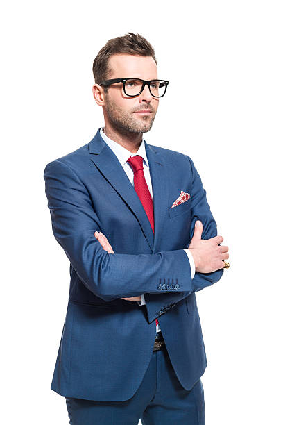 istock Confident businessman wearing elegant suit and glasses 506754724