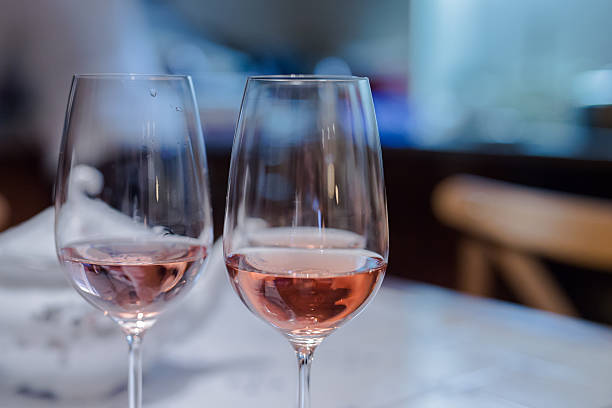 istock Cheers with pair of wine glasses 506755206