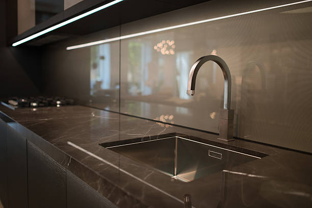 istock Water faucet in the kitchen 506755358