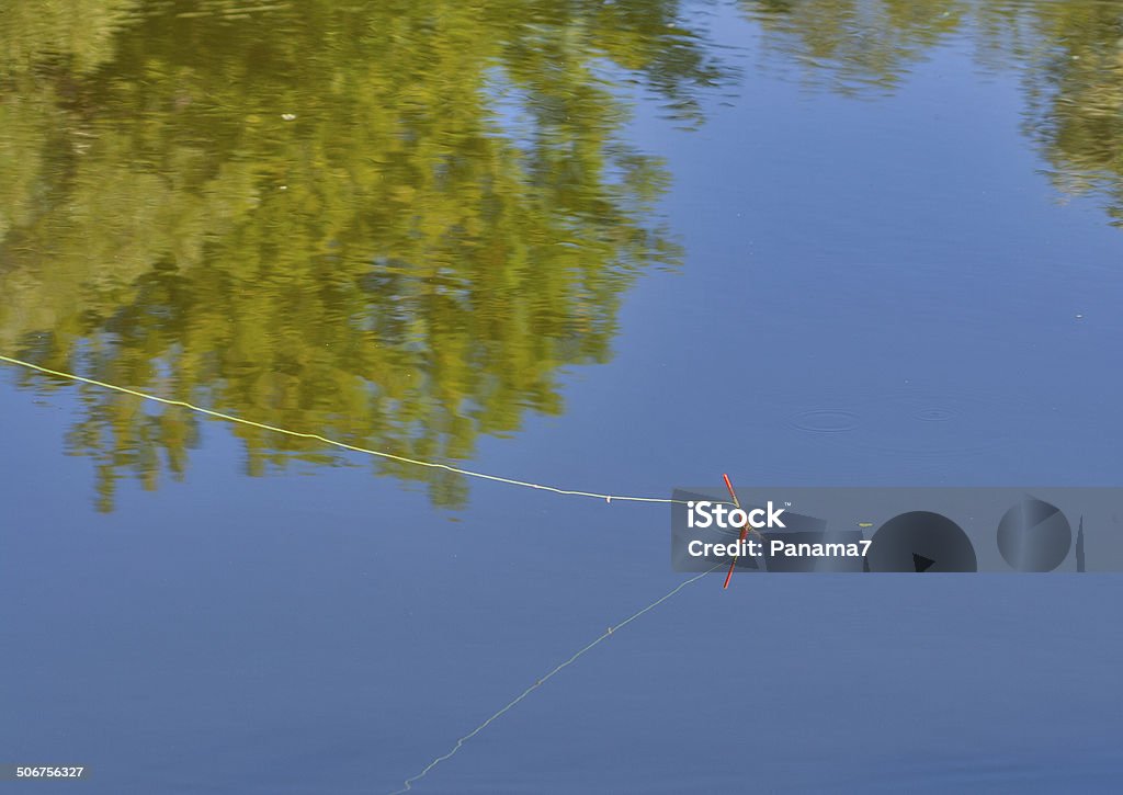 Float for fishing float fishing rod in the water Activity Stock Photo