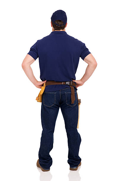 istock rear view of young repairman 506756680