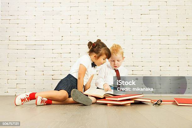 Reading Children Stock Photo - Download Image Now - Homework, Sibling, 4-5 Years