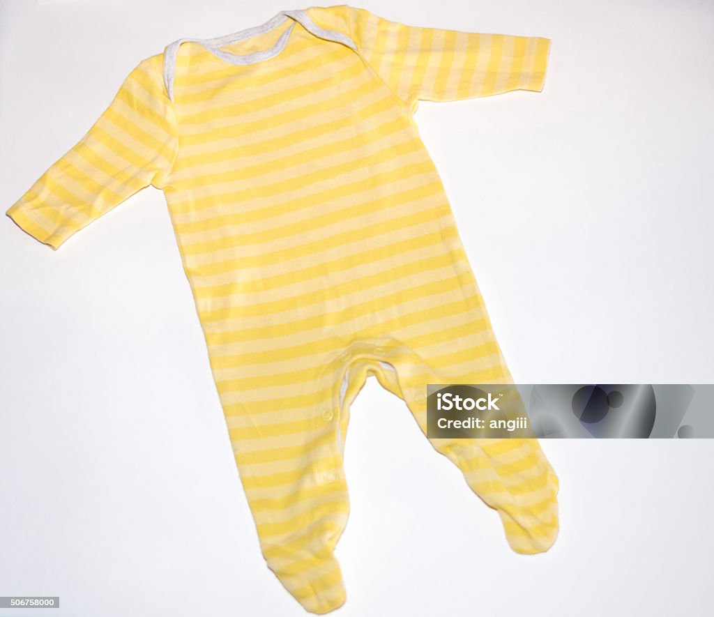 Cotton baby sleeper isolated on white background Yellow cotton baby sleeper isolated on white background Infant Bodysuit Stock Photo