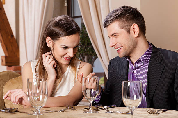 istock Happy couple in a restaurant 506759431