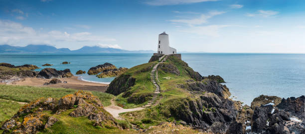 Llanddwyn Island A panorama of Llanddwyn Island, Anglesey wales mountain mountain range hill stock pictures, royalty-free photos & images