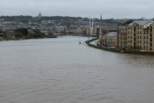 Lancaster, UK - January 26, 2016: Strong winds and heavy rain help cause a higher than normal High Tide at St. George's Quay, Lancaster. Flood warnings were in place, however the river did not breach it's banks.