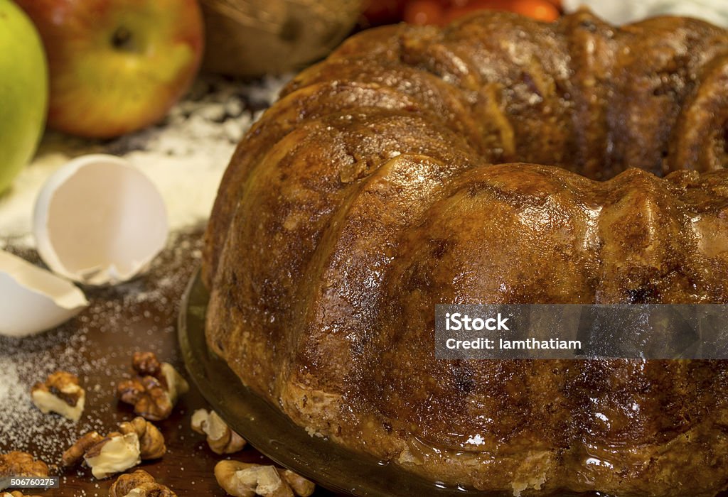 apple coconut cake with walnuts freshly baked apple coconut cake with walnuts in a bundt style Apple - Fruit Stock Photo