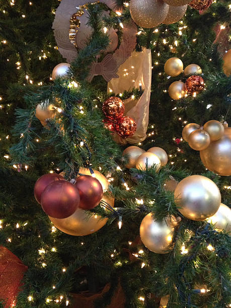 istock Holiday ornaments on Christmas tree 506760283