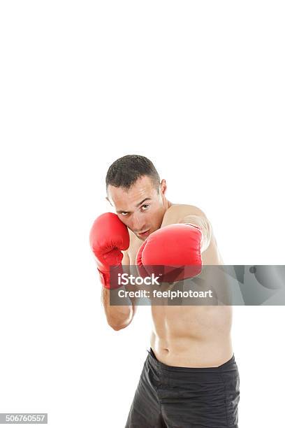 Man Punching With Red Boxing Gloves Isolated On White Background Stock Photo - Download Image Now