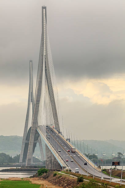 Honfleur, France - April 28, 2014: Morning shot of Pont de Normandie, cable-stayed bridge spanning the Seine river, It connects Le Havre to Honfleur in Normandy, Northern France.