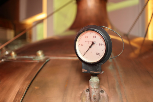 Retro thermometer on the tank at the old brewery