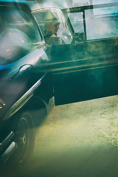 istock Woman in Antique Car 506762599