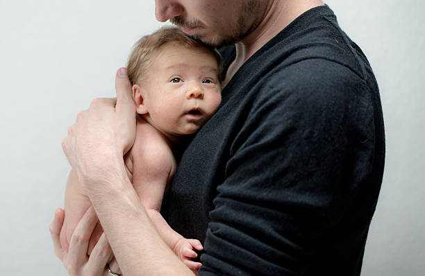 istock Dad with newborn baby 506762860