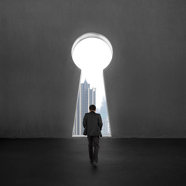 istock Walking toward to key shape door 506763049