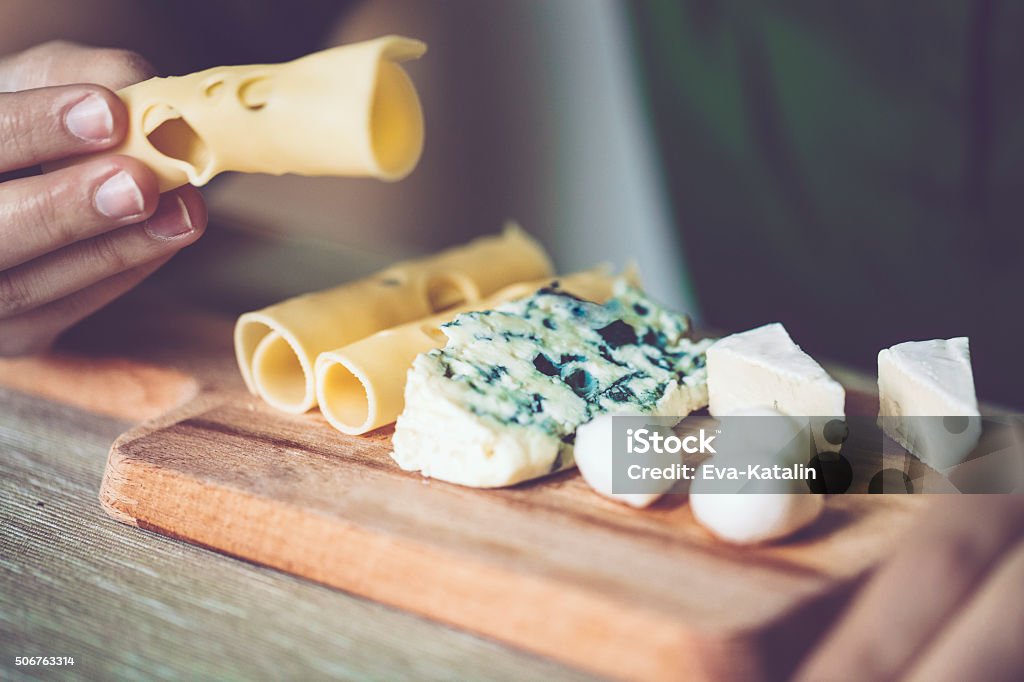 Having breakfast Young woman is having breakfast Cheese Stock Photo