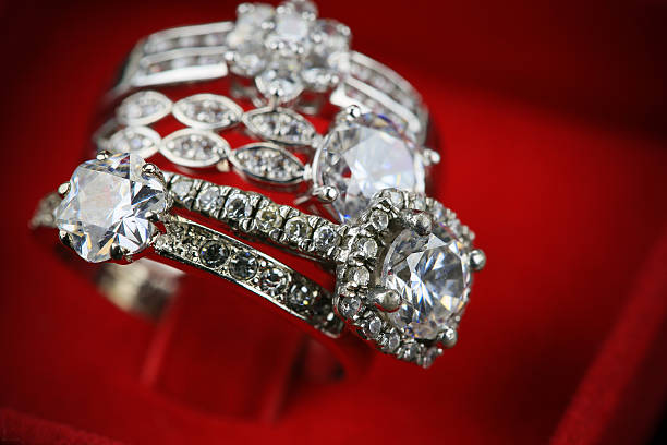 istock Wedding rings background, beautiful silver ring in red box 506763372