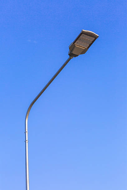 istock LED lamp for road with clear blue sky background 506765298
