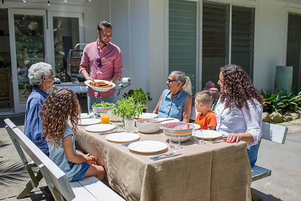 istock Barbecue lunch with all the family 506765700