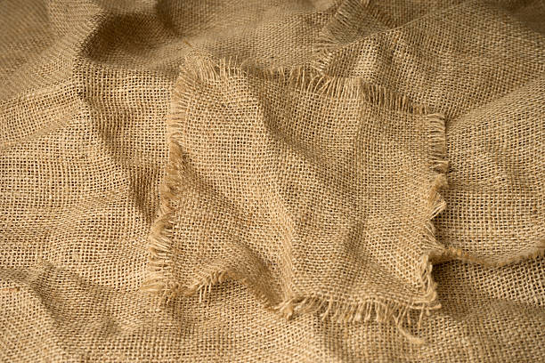 tekstura z juta hesjan z postrzępienia krawędzie - frayed burlap textile part of zdjęcia i obrazy z banku zdjęć