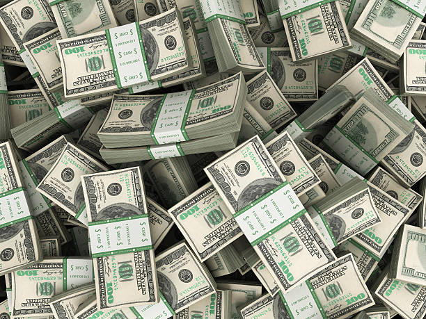 istock Background with money american hundred dollar bills stacks 506784790