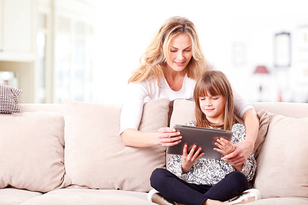 istock Mother and daughter at home 506786216