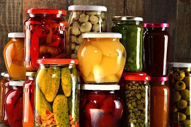 istock Jars with pickled vegetables, fruity compotes and jams 506787330