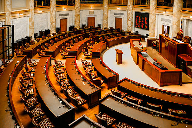 House of Representatives chamber inside the Arkansas State Capitol building Little Rock, AR, USA - June 12, 2015: House of Representatives chamber inside the Arkansas State Capitol building in Little Rock house of representatives photos stock pictures, royalty-free photos & images
