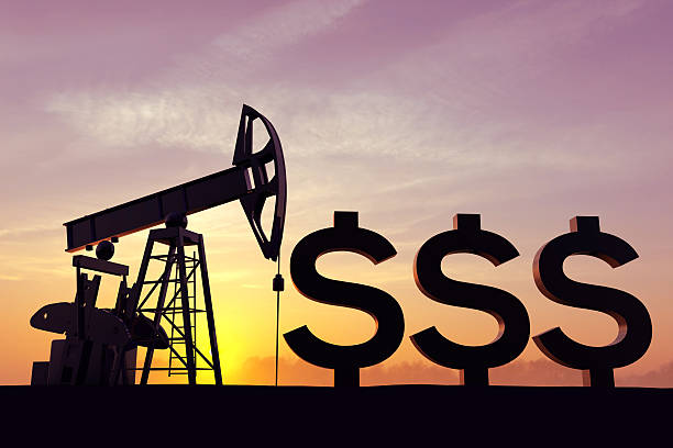 istock Oil pump with the dollar symbol 506789094