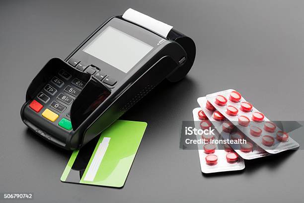 Pos Terminal Credit Card And Pill Blister Pack Stock Photo - Download Image Now - ATM, Addiction, Black Background