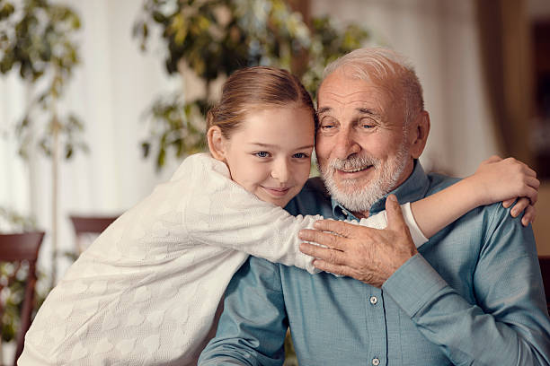 istock Young girl and grandfather 506792310