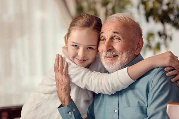 istock Young girl and grandfather 506792426