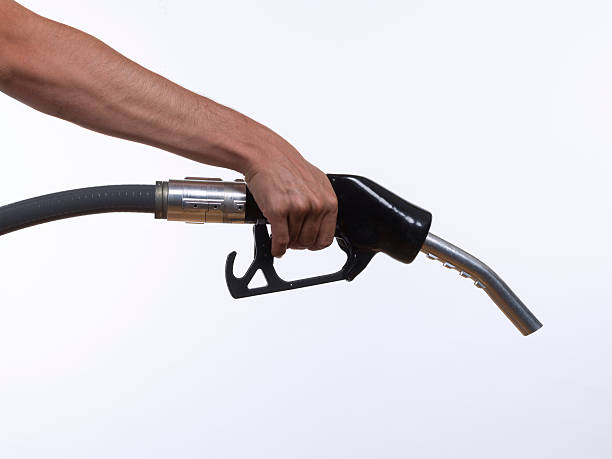 istock Hand holding a gas pump 506794281