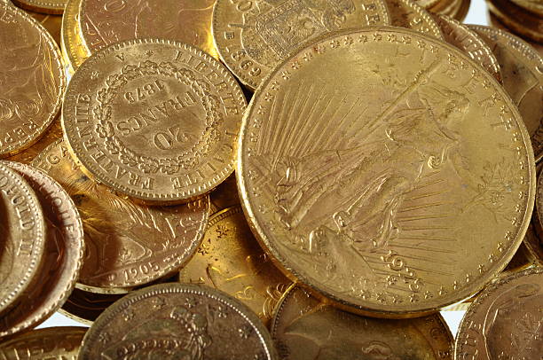 istock Lot of Gold coins for saving 506795213