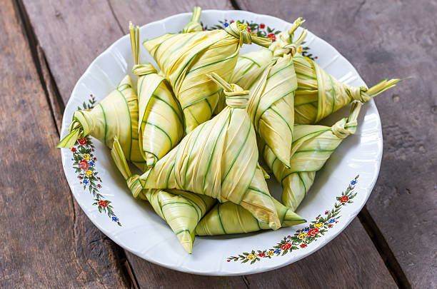 istock ketupat or sticky rice wrap with Licuala paludosa leaf 506797971