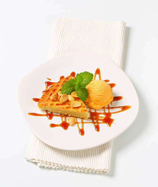 istock Almond cake with ice cream and caramel sauce 506798520