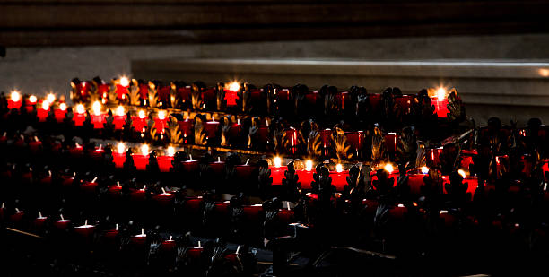 istock Candles in Catholic Church 506798543