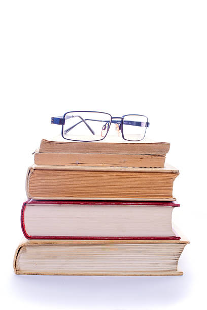 istock Eyeglasses on books 506798640