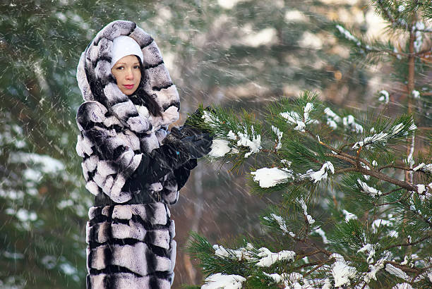 istock Happy young woman in winter 506799460