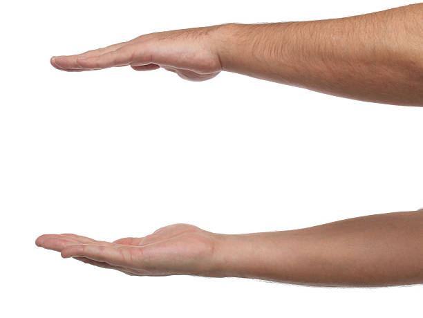istock Two male hands with space to put something. Isolated 506800187