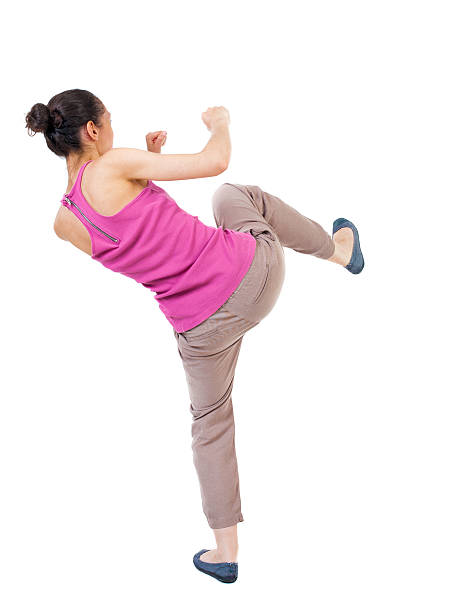 mujer ajustados funny peleas agitando sus brazos y piernas. - conflict fighting weakness isolated fotografías e imágenes de stock