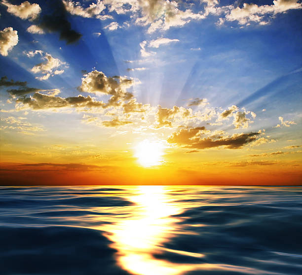 istock sunset at coast of the sea 506800962