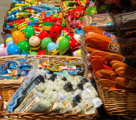 variety of souvenirs, souvenirs close up, ypical gift shop with variety of traditional middle eastern handmade souvenirs popular with tourists, decorations in a wicker basket 