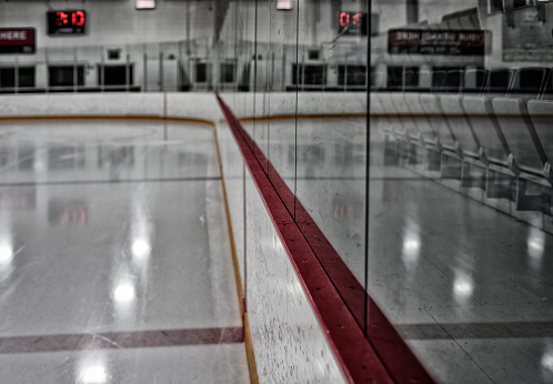 Indoor ice arena with reflection