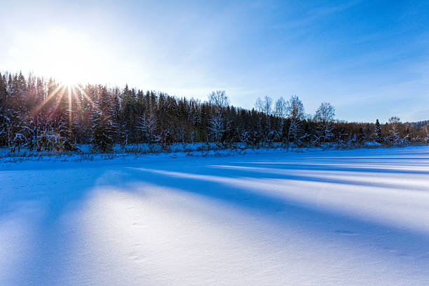 istock Sunrise over the frozen river 506813520