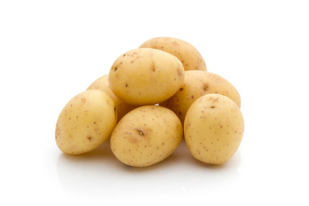 istock Potatoes on the white background.  New harvest. 506814204