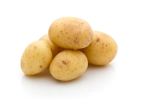 istock Potatoes on the white background.  New harvest. 506814458