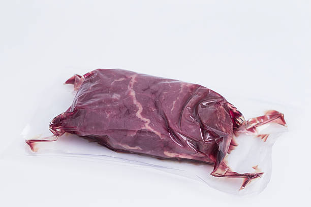 Fresh beef in vacuum stock photo