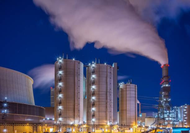 Power plant - energy industrie A big coal fired power plant. long exposure industry factory hamburg germany stock pictures, royalty-free photos & images