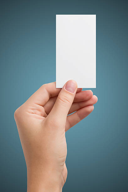 istock Hand holding white blank business visit card, gift, ticket, pass 506817038